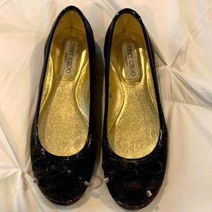 Jimmy Choo black and gold flats